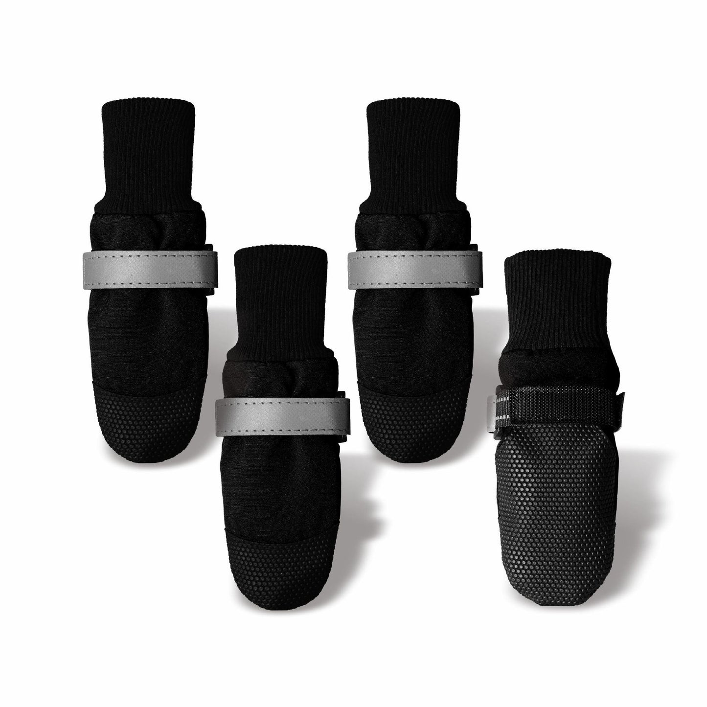 Set of four black pet boots with reflective straps on a white background