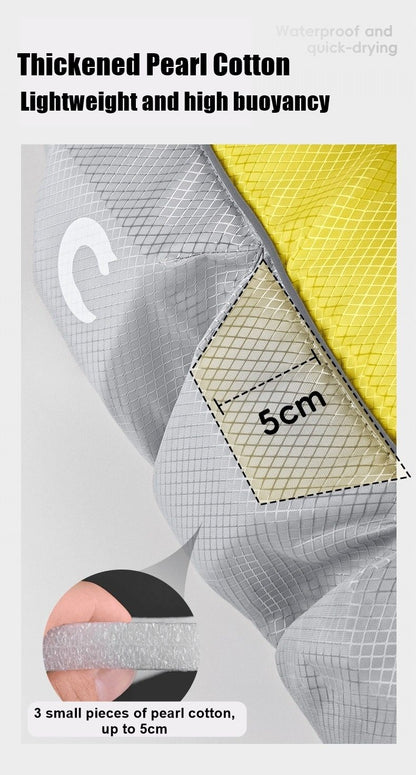 Textured fabric of dog life jacket with pearl cotton details and measurement, on a light gray background.
