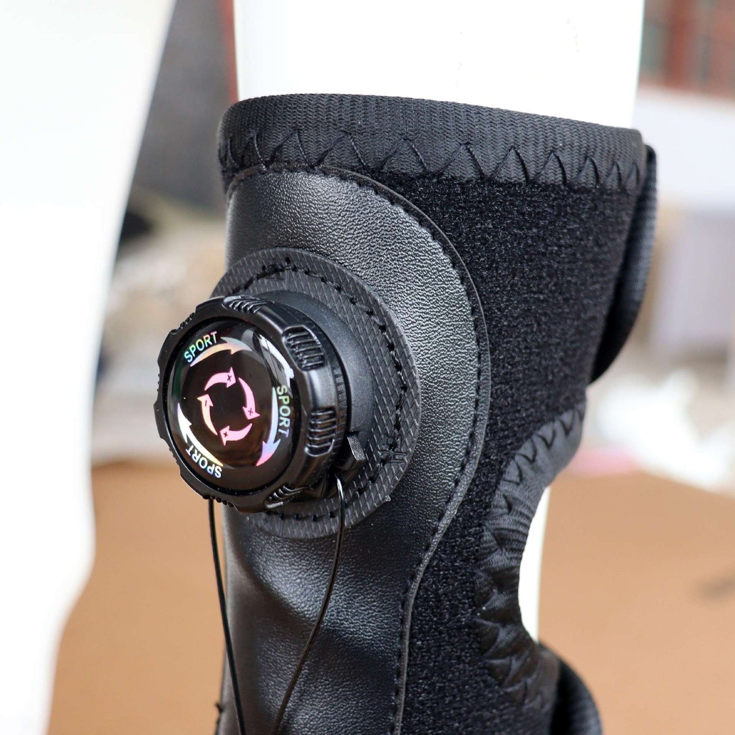 close up the adjustment knob of Lift Toe Drop Dog Not Knuckling Foot Boot Brace