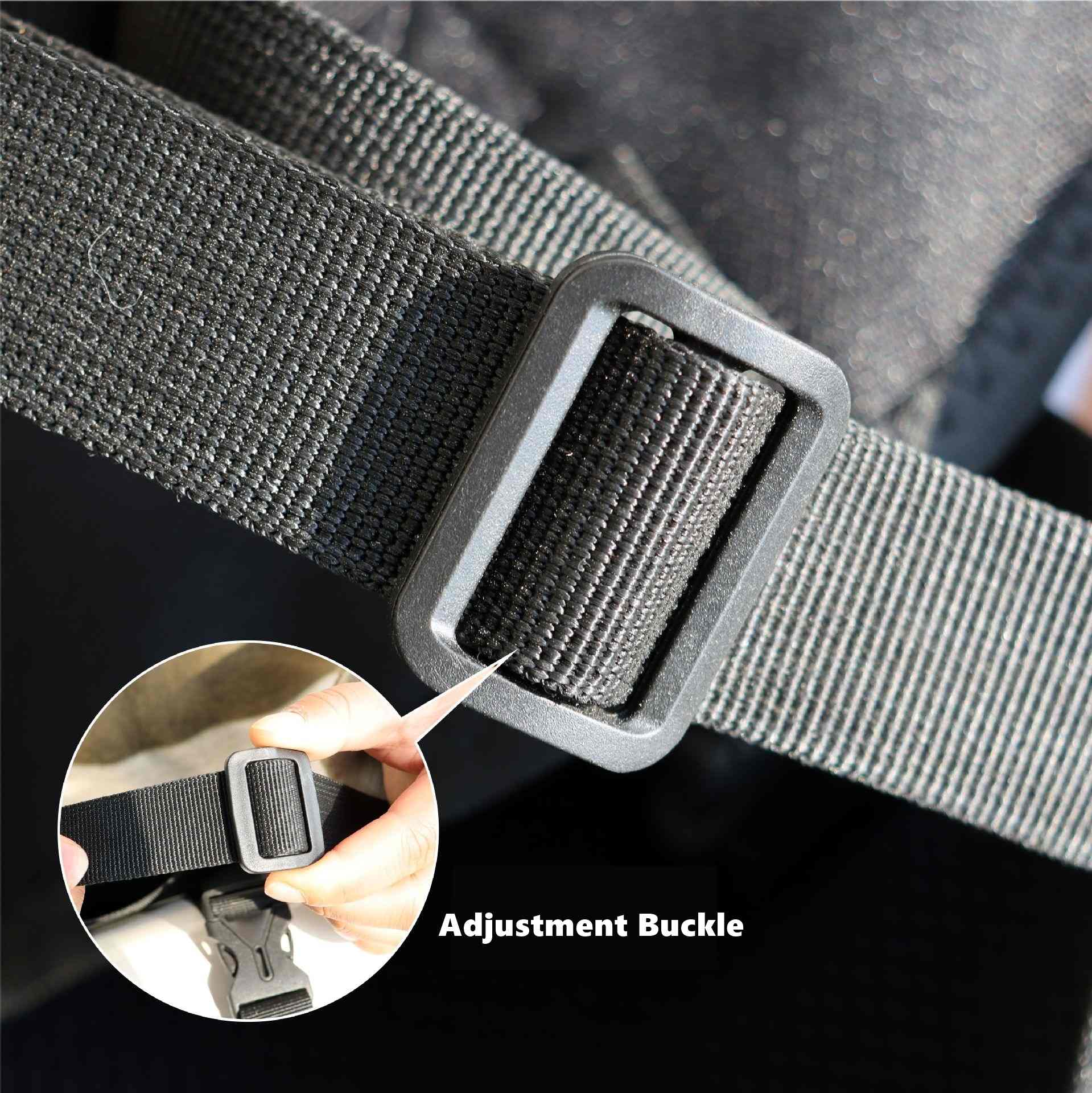 Gray belt with black adjustment buckle on a dark background