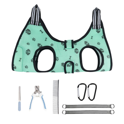 Pet Grooming Hammock Harness with bone and paw pattern, grooming tools, and carabiners on a white background